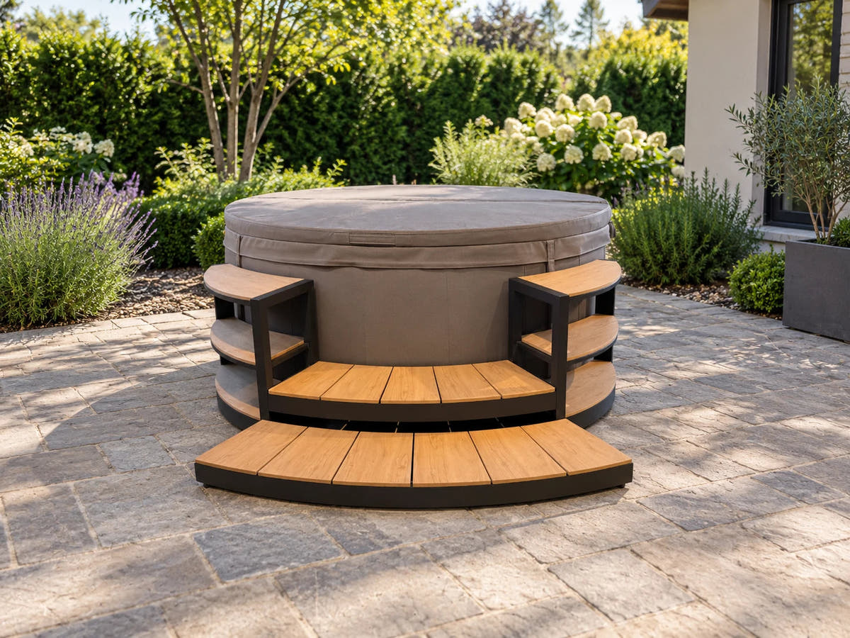 Nantucket surround with wood-toned steps and shelves around a covered spa on a garden patio.